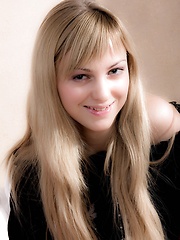 Sweet blonde teen playing with a sex toy
