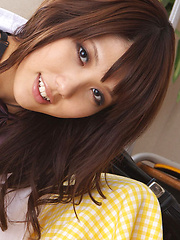 Asami Tsubaki Asian in uniform spreads legs and shows panty