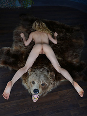 Curly haired blonde beauty shows the stuff of your dreams as she shows her juicy pussy with unusual scenery.