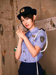 Rina Akiyama Asian in police woman uniform exposes sexy legs